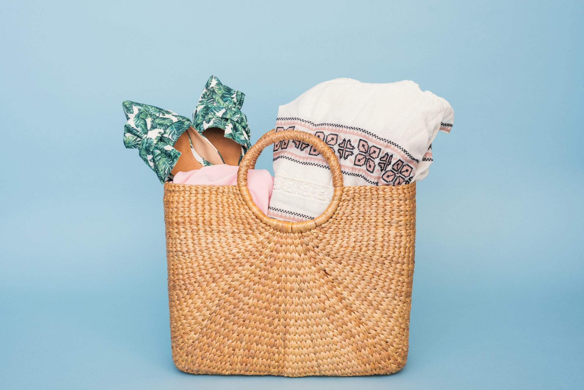 Folded towels stored in a basket